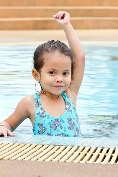 Girl are smiling and practice swimming — Stock Photo, Image