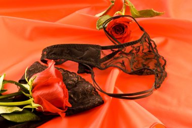 Black lingerie and red roses clipart