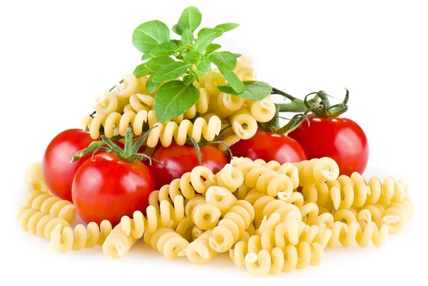 Fusilli pasta with tomatoes and basil — Stock Photo, Image