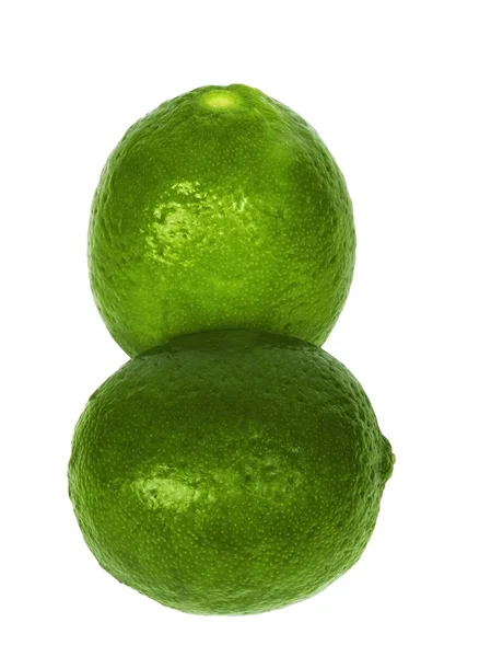 Two ripe lime on a white background — Stock Photo, Image