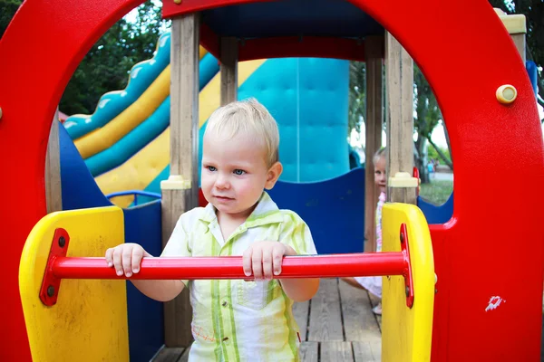 The kid in the playground — Stock Photo, Image