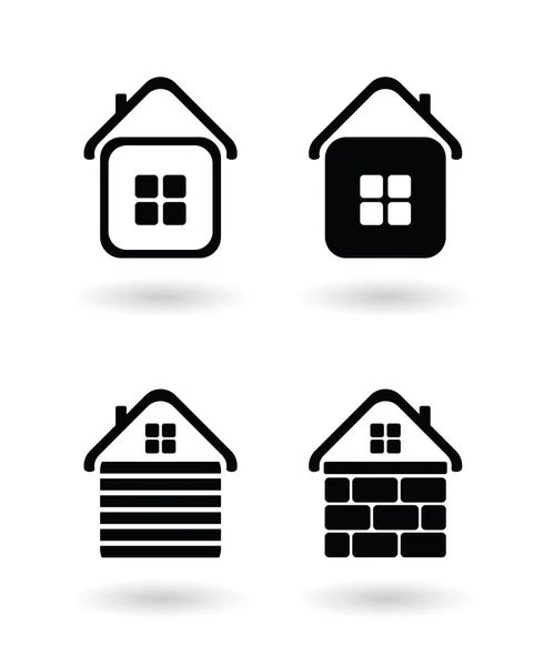Set di quattro varianti di icone vettoriali della casa — Vettoriale Stock