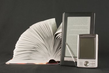 Open book, electronic book reader and hand held computer on black backgroun clipart