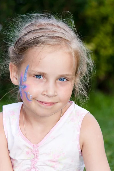 Beautiful girl with flower paining on her face — Stock Photo, Image
