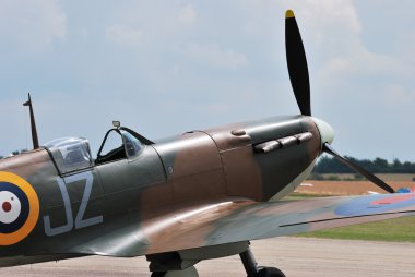 Spitfire standing on runway clipart