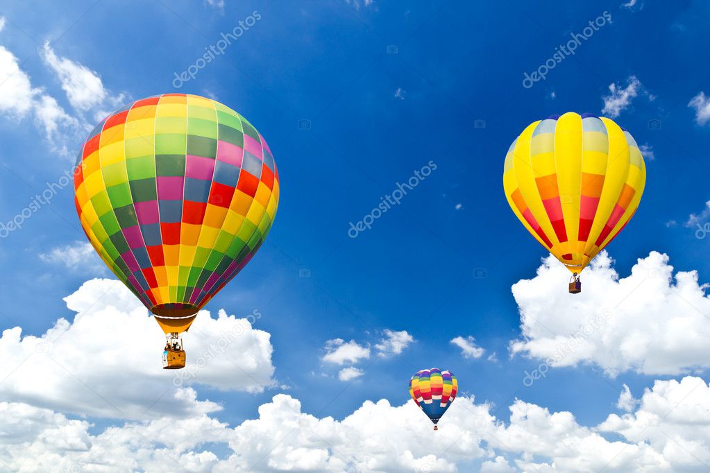 Colorful hot air balloon against blue sky
