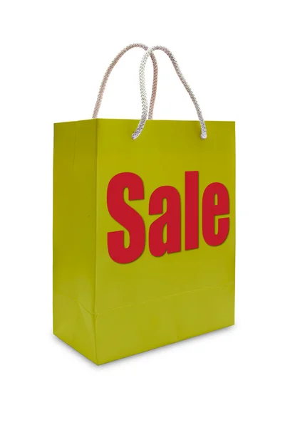 Sale label on yellow shopping paper bag — Stock Photo, Image
