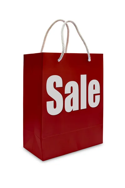 Sale label on red shopping paper bag — Stock Photo, Image