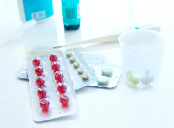 Medicines lie on a table — Stock Photo, Image