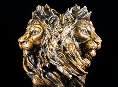 Two faces of lion statue clipart