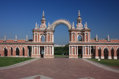 Moscow. Museum - reserve “Tsaritsyno”. Galarea-the fence with a gate. clipart