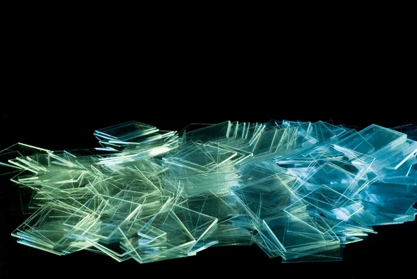 Spillde tunn kvadratisk form glas — Stockfoto