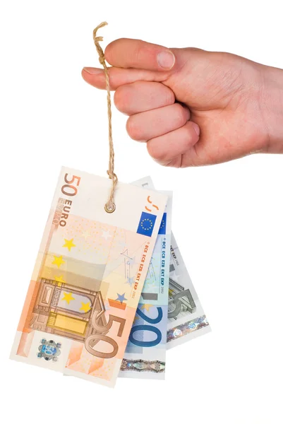 Targhetta delle banconote in euro sul pollice Immagine Stock