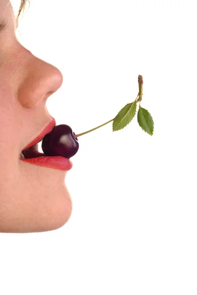 Cereja na boca — Fotografia de Stock