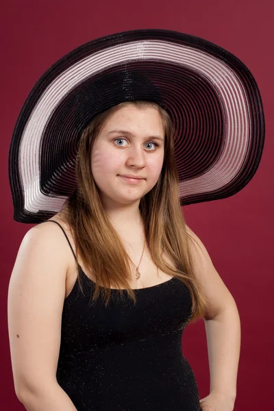 Portrait of girl in dress and hat isolated — Stock Photo, Image