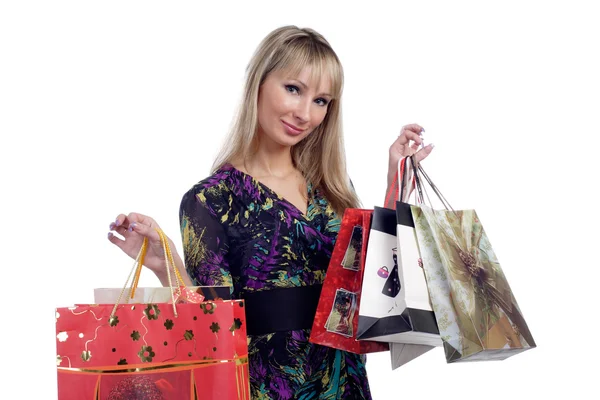 Hermosa chica joven mantenga bolsas de compras —  Fotos de Stock