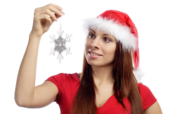 Sexy girl in red dress hold snowflake — Stock Photo, Image