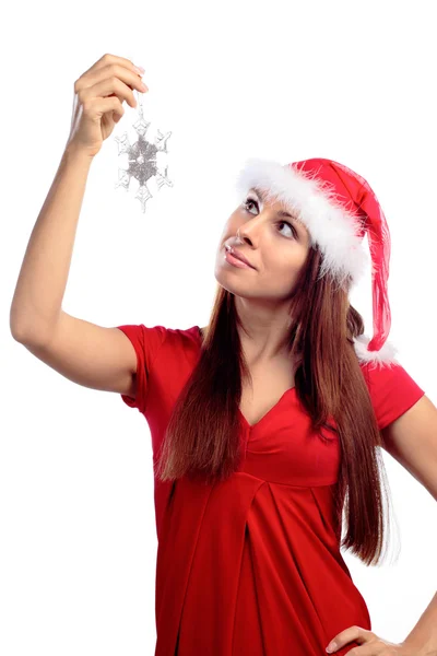 Sexy girl in red dress hold snowflake Royalty Free Stock Images