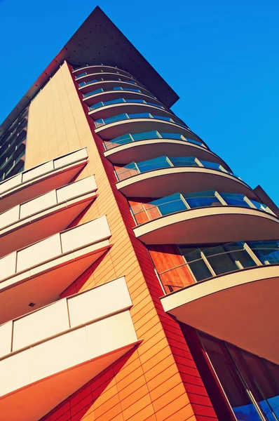 Πορτοκαλί διαμέρισμα κτίριο — Φωτογραφία Αρχείου