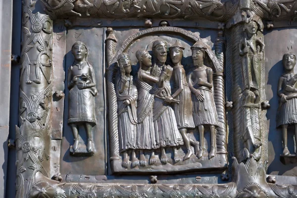 Bas-relief on the bronze doors of St. Sophia Cathedral. Veliky N Royalty Free Stock Photos