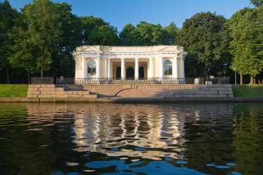 Pavilion pier in the Mikhailovsky Garden on the shore sinks in 1 clipart