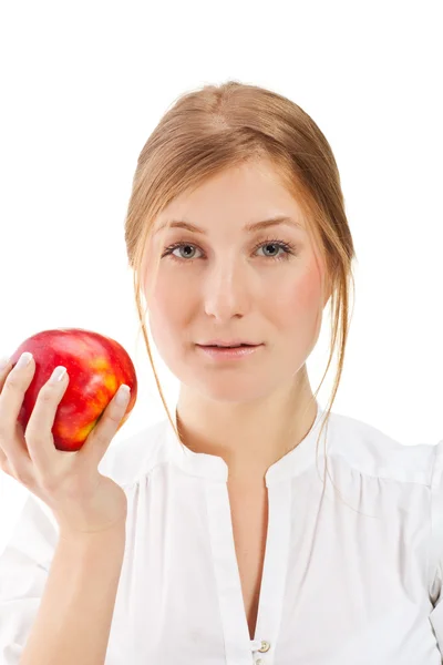 Красивая женщина держит яблоко — стоковое фото