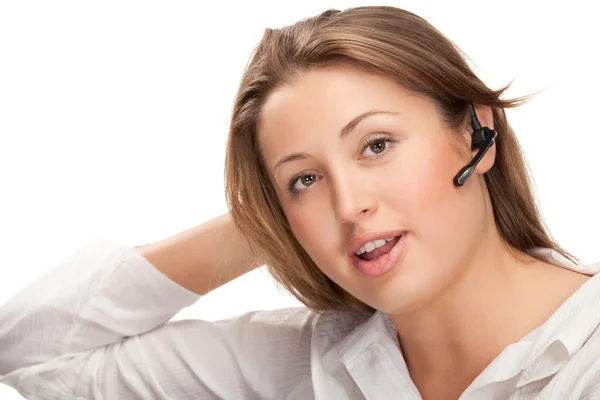 Young beautiful business woman with headsetling — Stock Photo, Image