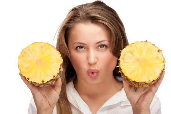 Lovely blonde with pineapple — Stock Photo, Image