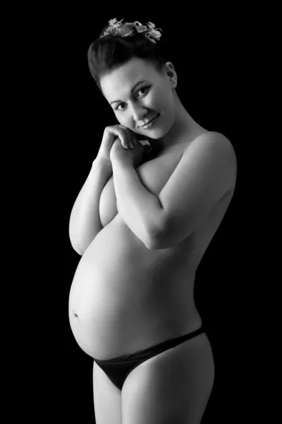 Beautiful pregnant woman in back — Stock Photo, Image
