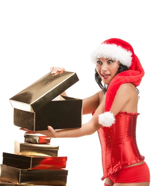 Schöne Weihnachtsfrau mit Weihnachtsmütze — Stockfoto