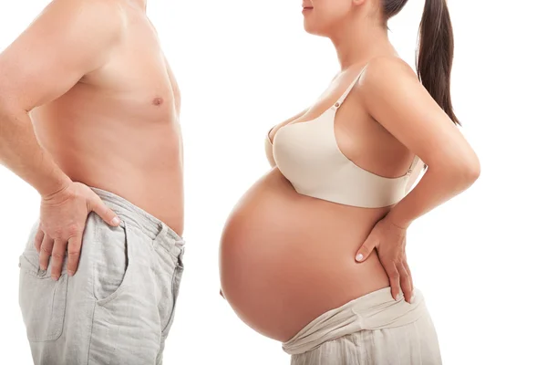 Зрелая беременная женщина с мужем — стоковое фото