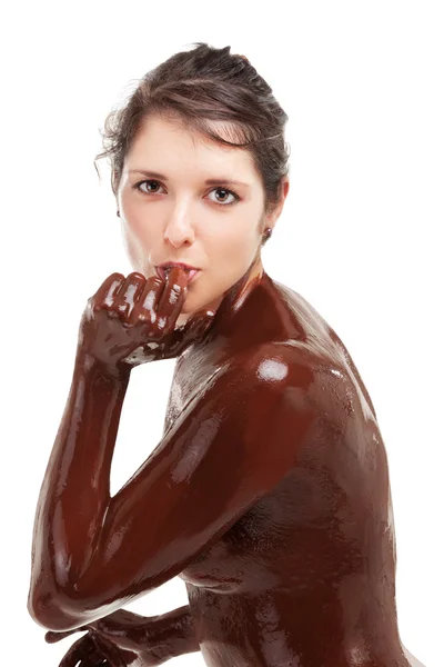 Žena zahrnuty sladké smetany čokoládová — Stock fotografie