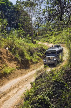 Jeep on Dirt Road clipart