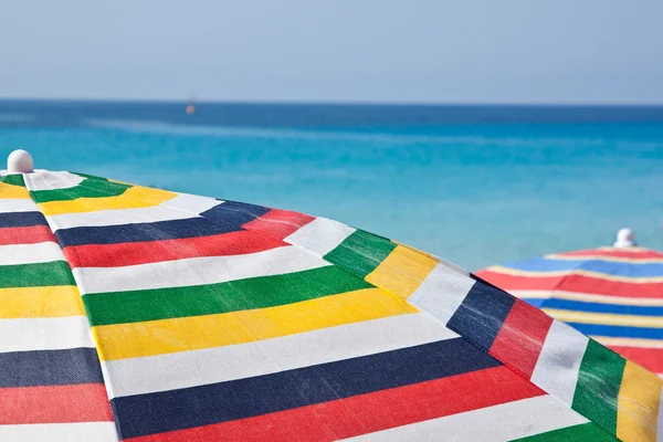 Umbrella on the beach — Stock Photo, Image