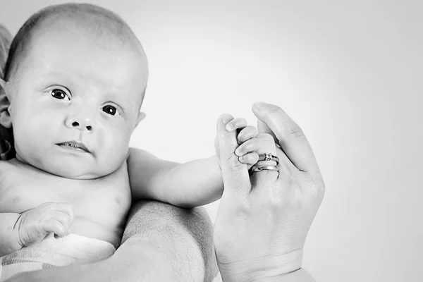Little baby holding finger — 图库照片