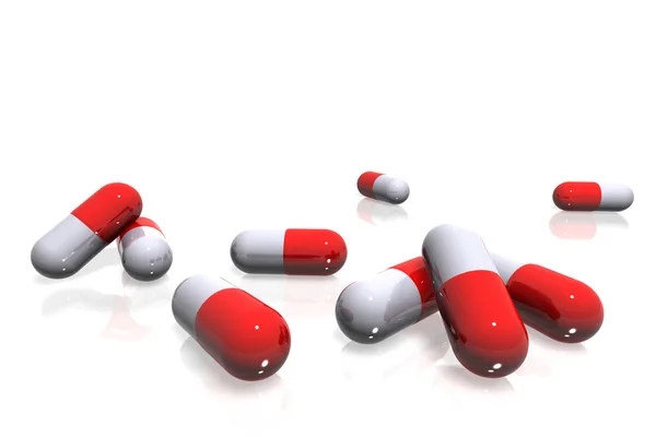 Czerwone białe tabletki — Zdjęcie stockowe