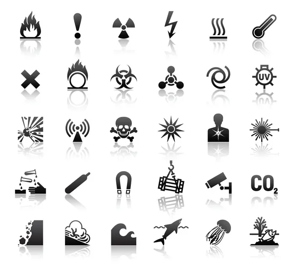 Iconos de peligro símbolos negros — Vector de stock