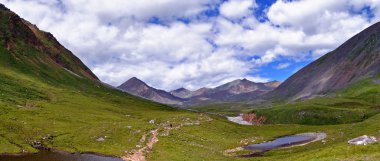 The trail in the valley trough. Eastern Sayan. Buryatia clipart