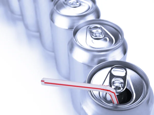 Soda cans and straw — Stock Photo, Image