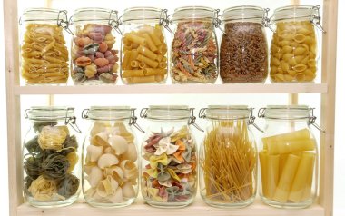 Glass jar filled with pasta clipart