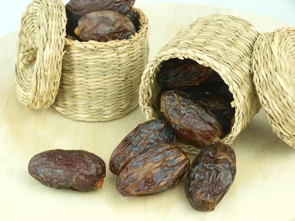 Dried black dates — Stock Photo, Image