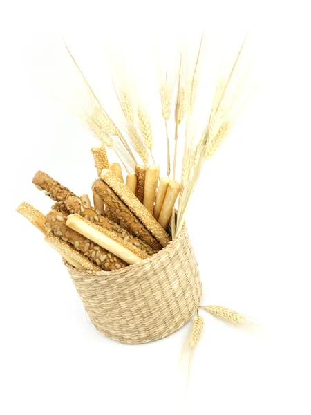 Fresh grissini bread sticks in a basket — Stock Photo, Image