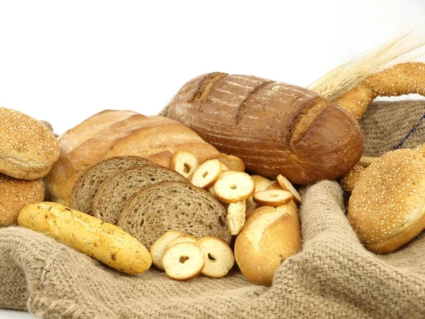 Various types of bread and other wheat products — Stock Photo, Image