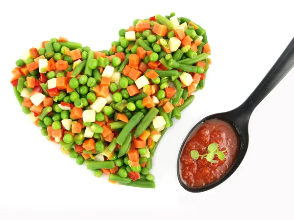 Herz eines gefrorenen gemischten Gemüses — Stockfoto