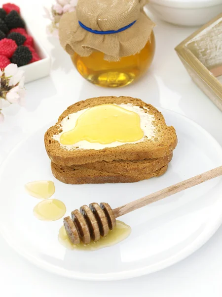 Miele sul pane tostato — Foto Stock