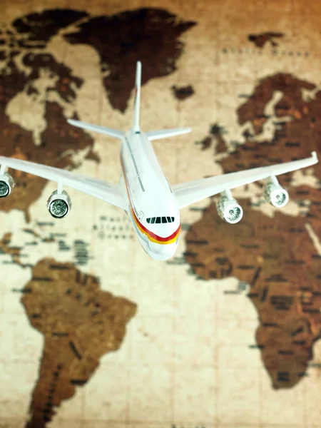 Αεροπλάνο πάνω από τον παγκόσμιο χάρτη — Φωτογραφία Αρχείου