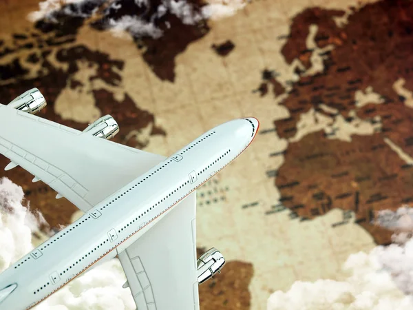 Letadlo nad mapa světa — Stock fotografie