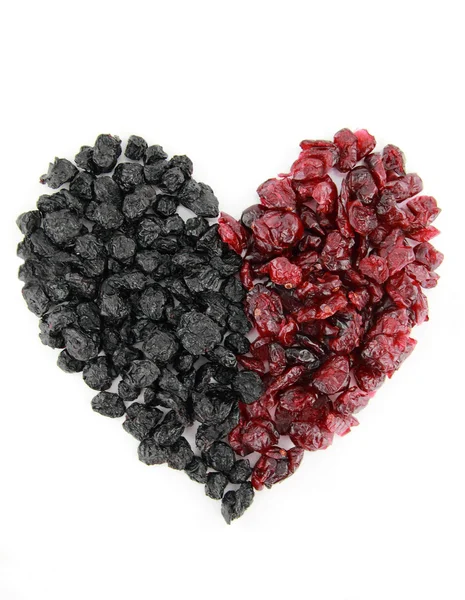 Heart of dried blueberries and cranberries — Stock Photo, Image