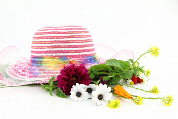 Hat and flower bouquet — Stock Photo, Image