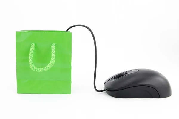 Computer mouse connected to a green shopping bag — Stock Photo, Image